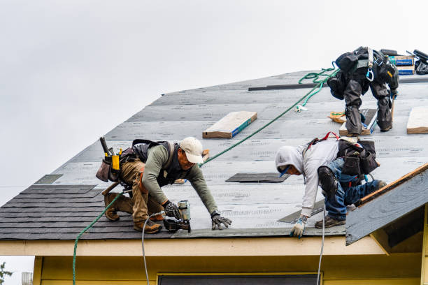 Professional Roofing technician working in Riderwood, MD